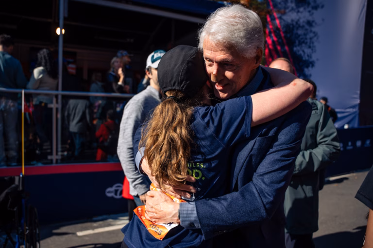 Bill Clinton shows up at NYC Marathon finish line with mysterious bandage